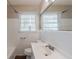 Clean bathroom with white tiled walls and a vanity at 3582 Swallow Ln, Decatur, GA 30032