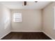 Bedroom with hardwood floors, ceiling fan, and window at 3582 Swallow Ln, Decatur, GA 30032