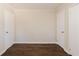 Spacious bedroom featuring hardwood floors and double closets at 3582 Swallow Ln, Decatur, GA 30032