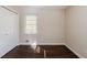 Well-lit bedroom with hardwood floors and a closet at 3582 Swallow Ln, Decatur, GA 30032