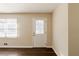 Front entry with white door, hardwood floors and neutral walls at 3582 Swallow Ln, Decatur, GA 30032