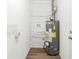 Functional laundry room with washer/dryer hookups and storage at 3582 Swallow Ln, Decatur, GA 30032