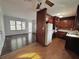 Open-concept layout with hardwood floors, connecting the living and kitchen areas at 6070 Blackhawk Se Trl, Mableton, GA 30126