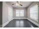 Bedroom with hardwood floors, neutral walls and ceiling fan at 3693 Aldea Dr, Decatur, GA 30032