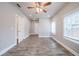 Bright bedroom with hardwood floors and ceiling fan at 3693 Aldea Dr, Decatur, GA 30032