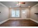 Living room with hardwood floors, neutral walls and ceiling fan at 3693 Aldea Dr, Decatur, GA 30032