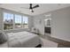 Bright bedroom with city view, large windows, and ensuite bathroom at 244 Castleberry Station Sw Dr, Atlanta, GA 30313