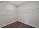 Walk-in closet with wire shelving providing ample storage at 244 Castleberry Station Sw Dr, Atlanta, GA 30313