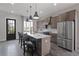Modern kitchen with stainless steel appliances and an island at 244 Castleberry Station Sw Dr, Atlanta, GA 30313