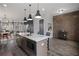 Modern kitchen with island, stainless steel appliances, and white countertops at 244 Castleberry Station Sw Dr, Atlanta, GA 30313