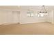 Finished basement with carpet, recessed lighting and several large windows at 701 Vinings Estates Se Dr, Smyrna, GA 30126
