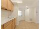 Basement space with a wet bar, cabinets and tile flooring at 701 Vinings Estates Se Dr, Smyrna, GA 30126
