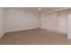 Large basement features neutral carpet flooring, base trim, and recessed lights at 701 Vinings Estates Se Dr, Smyrna, GA 30126