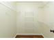 A spacious walk-in closet with multiple shelves for organization at 701 Vinings Estates Se Dr, Smyrna, GA 30126