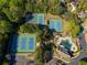 Aerial view showcasing the pool, tennis courts and other community features at 701 Vinings Estates Se Dr, Smyrna, GA 30126