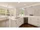 Open-concept kitchen with stainless steel appliances and natural light at 701 Vinings Estates Se Dr, Smyrna, GA 30126