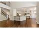 Bright kitchen with stainless steel appliances, white cabinetry, and a breakfast bar at 701 Vinings Estates Se Dr, Smyrna, GA 30126
