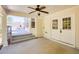 Covered patio offers a view of the deck and backyard with double door entry at 701 Vinings Estates Se Dr, Smyrna, GA 30126