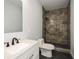 Updated bathroom, featuring a walk-in shower and vanity at 153 Oak St, Hiram, GA 30141