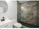 Modern bathroom with a large walk-in shower and vanity at 153 Oak St, Hiram, GA 30141