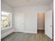Bedroom with closet, window, and access to another room at 153 Oak St, Hiram, GA 30141