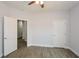 Spacious bedroom with two doors and wood-look floors at 153 Oak St, Hiram, GA 30141