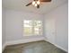 Bedroom with double window, ceiling fan and closet at 153 Oak St, Hiram, GA 30141