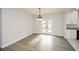 Bright dining room with hardwood floors and French doors leading to a deck at 153 Oak St, Hiram, GA 30141
