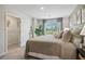 Spacious bedroom with large window and walk-in closet at 2096 Moss Hill Road, Stone Mountain, GA 30088