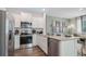 Modern kitchen with stainless steel appliances and granite countertops at 2096 Moss Hill Road, Stone Mountain, GA 30088