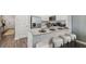 Kitchen island with seating for three, granite countertops at 2096 Moss Hill Road, Stone Mountain, GA 30088