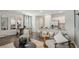 Open concept kitchen and living area with modern appliances and island at 2096 Moss Hill Road, Stone Mountain, GA 30088