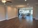 Open-concept living area showcasing hardwood floors and recessed lighting, connecting seamlessly to the kitchen at 391 Lincoln St, Woodstock, GA 30188