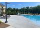 Relax poolside with comfortable lounge chairs and convenient access to the community facilities at 391 Lincoln St, Woodstock, GA 30188