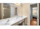 Double vanity bathroom with a shower and access to bedroom at 3111 Green Gate Se Way, Conyers, GA 30013