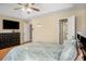Spacious bedroom with hardwood floors and ceiling fan at 3111 Green Gate Se Way, Conyers, GA 30013