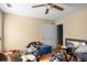 Bedroom with hardwood floors and ceiling fan at 3111 Green Gate Se Way, Conyers, GA 30013