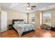 Bright bedroom with ceiling fan and hardwood floors at 3111 Green Gate Se Way, Conyers, GA 30013