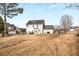 Two story house, white exterior, deck, large yard at 3111 Green Gate Se Way, Conyers, GA 30013