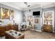 Living room with a TV, comfy seating, and eclectic decor at 3111 Green Gate Se Way, Conyers, GA 30013