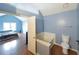 Bathroom with a soaking tub and toilet, offering a private retreat at 8045 Woodlake Dr, Riverdale, GA 30274