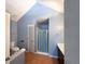 Bathroom featuring a shower with a patterned curtain, toilet, and vanity at 8045 Woodlake Dr, Riverdale, GA 30274