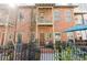 Brick townhouse with a private patio and fenced yard at 3371 Dogwood Dr # 120, Hapeville, GA 30354