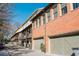 Townhouse community with attached garages and brick exteriors at 3371 Dogwood Dr # 120, Hapeville, GA 30354