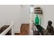 Upper hallway with hardwood floors and stylish decor at 3371 Dogwood Dr # 120, Hapeville, GA 30354