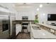 Modern kitchen with granite countertops and stainless steel appliances at 3371 Dogwood Dr # 120, Hapeville, GA 30354