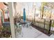Small patio with table and chairs, perfect for relaxing at 3371 Dogwood Dr # 120, Hapeville, GA 30354