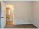 Bedroom with carpet, and access to another bedroom and bathroom at 6179 Dana Ct, Lithonia, GA 30058