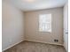 Bright bedroom with neutral walls and carpet flooring at 6179 Dana Ct, Lithonia, GA 30058