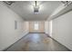 Attached garage with automatic opener and concrete floor at 6179 Dana Ct, Lithonia, GA 30058
